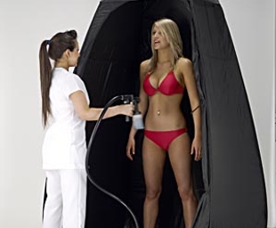 Enhance Spray Tanning use a spray tan cubicle to protect carpet and furnishings
